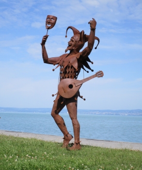 Harlequin life size sculpture rusty